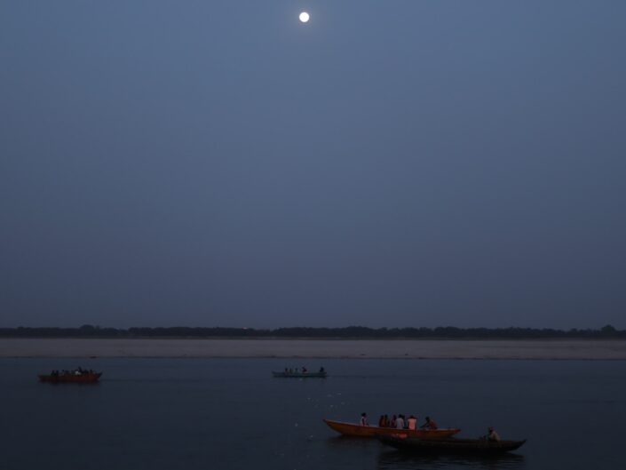 Varanasi ghat photography with boats, moon and ganga river